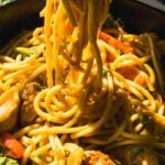 Lo mein noodles tossed in sauce with veggies.