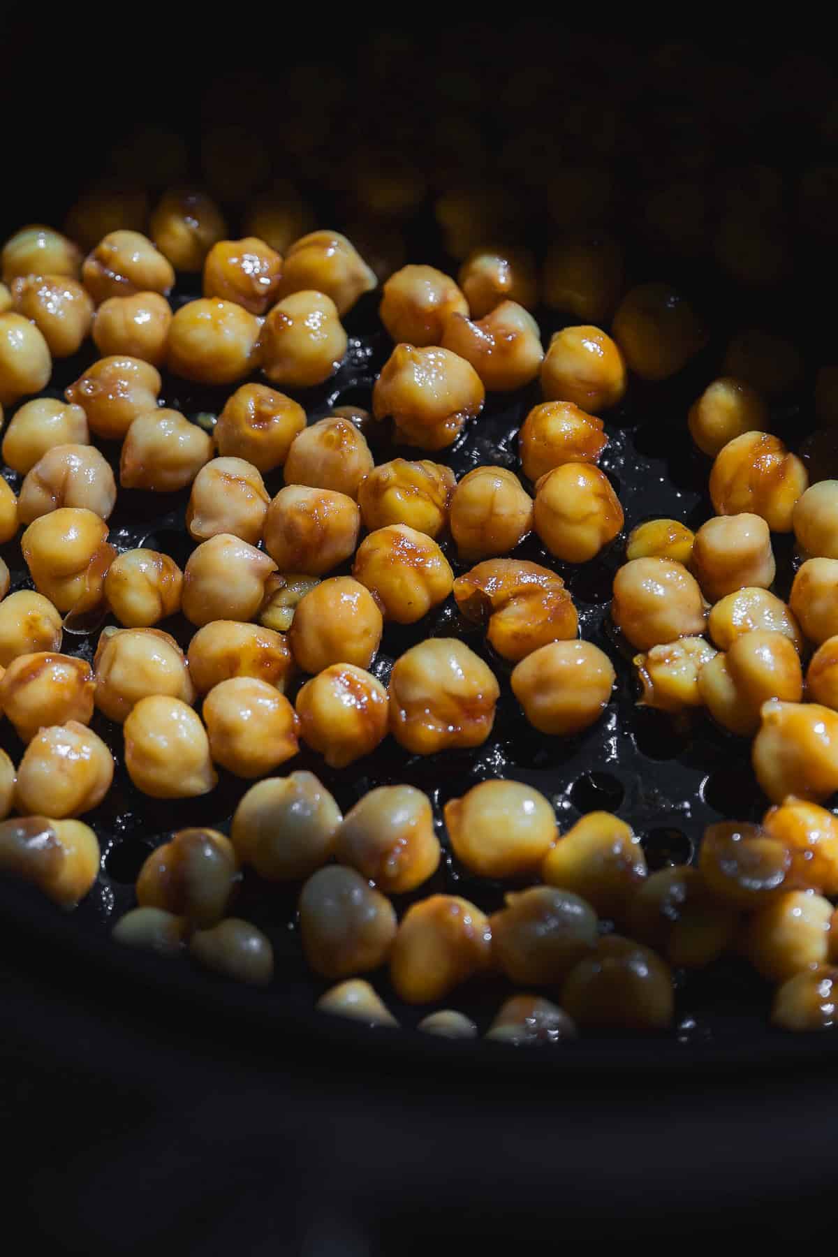 Chickpeas about to be cooked in an air fryer.