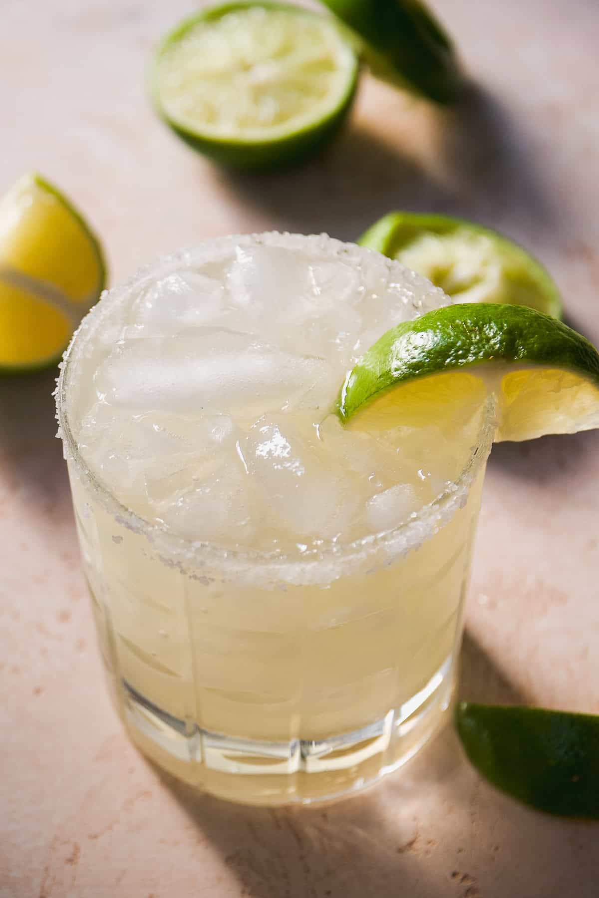 Margarita in a glass with salt on the rim.