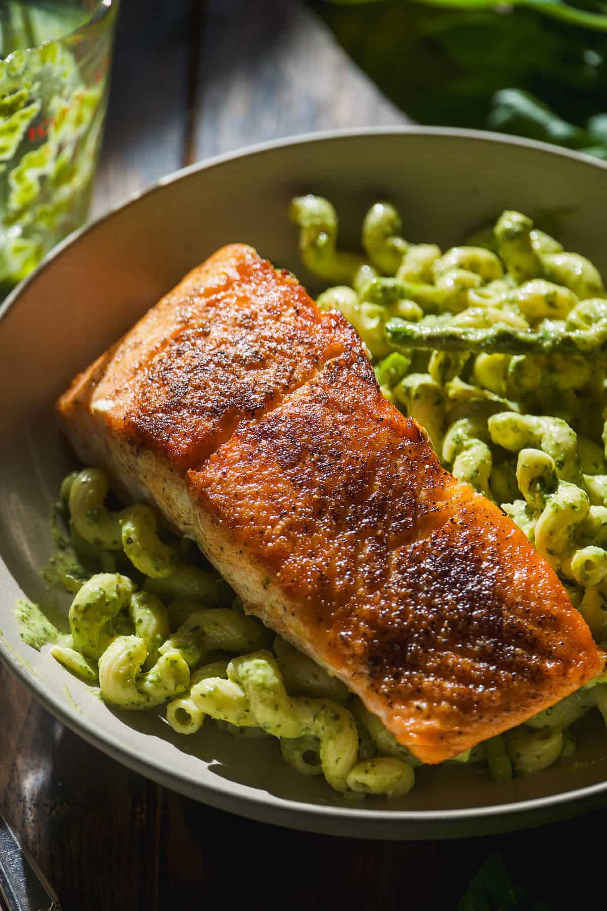 Basil pesto pasta with seared salmon.