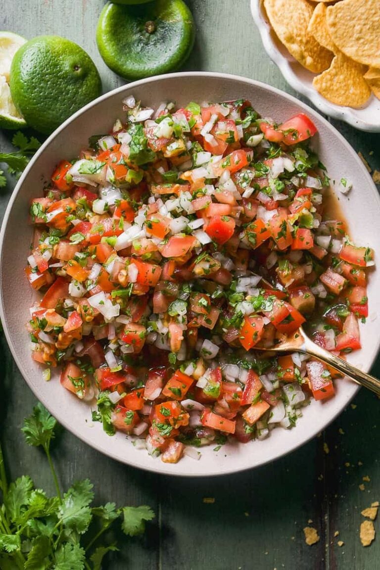 Pico de gallo in a white bowl.