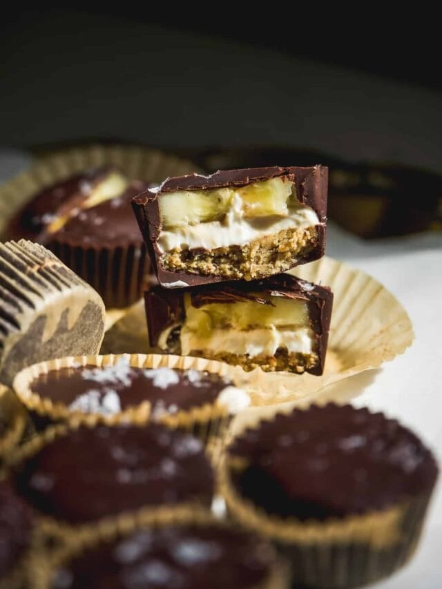 Frozen banana bites covered in chocolate in a wrapper.