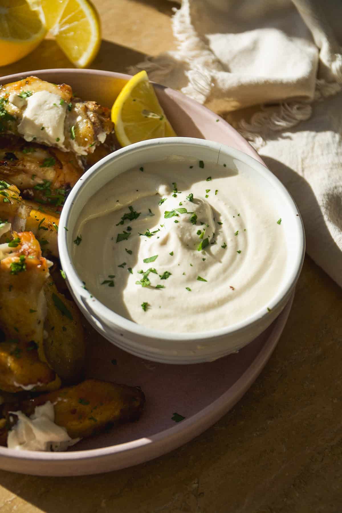 Greek chicken wings with tahini feta dip.