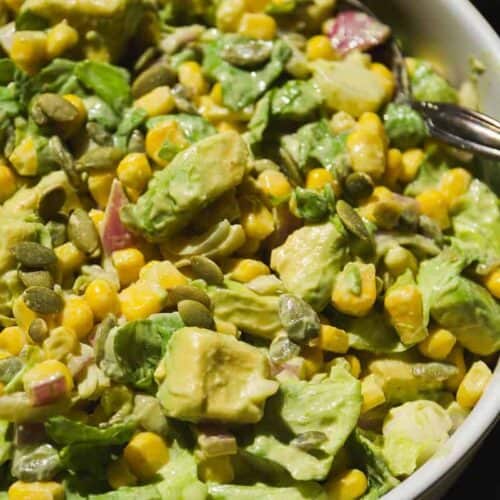 Corn and avocado salad in a plate.