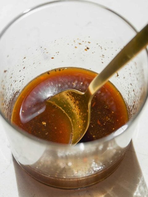 Coconut aminos sauce mixed in a glass jar.