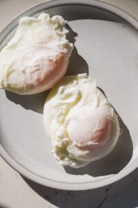 Poached eggs on a plate.