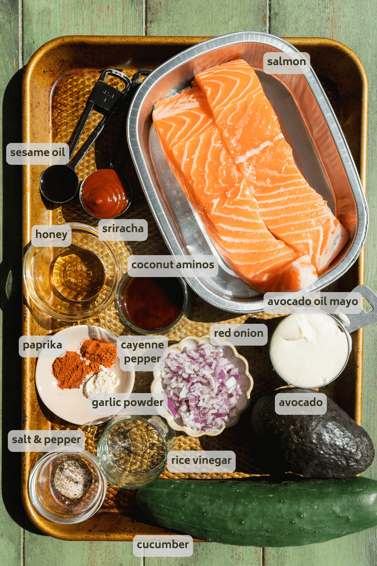 Bang bang salmon ingredients no a sheet pan with labels.