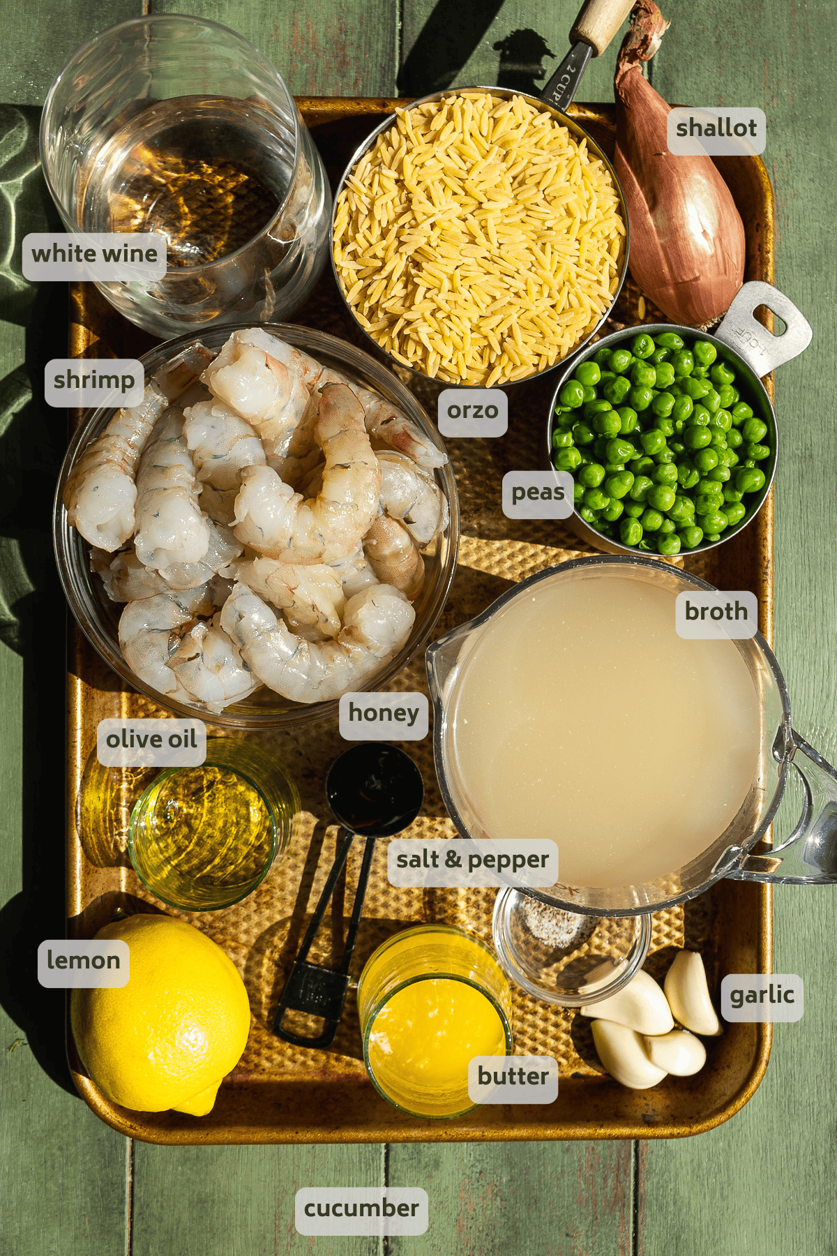 Garlic butter shrimp ingredients on a pan with labels.