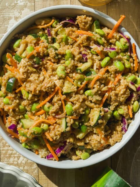 Plate of edamame salad with almond butter dressing.