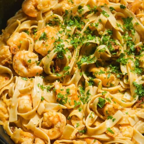 Marry me pasta with shrimp in a cast iron skillet.