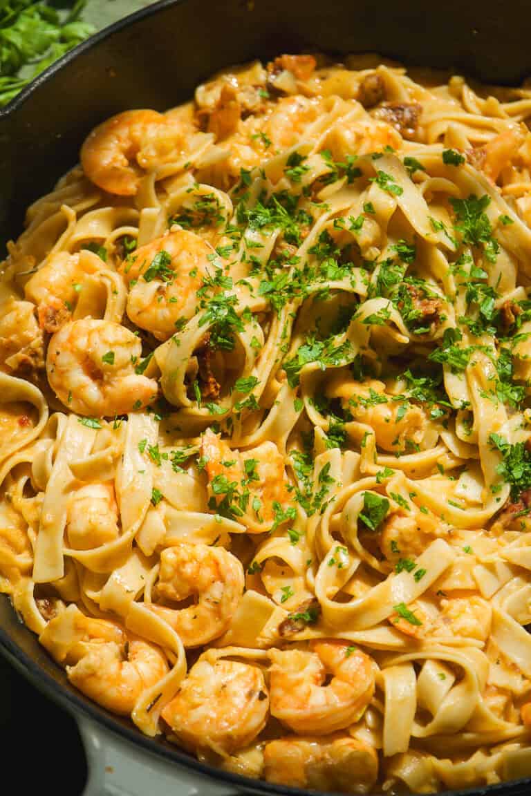 Marry me pasta with shrimp in a cast iron skillet.