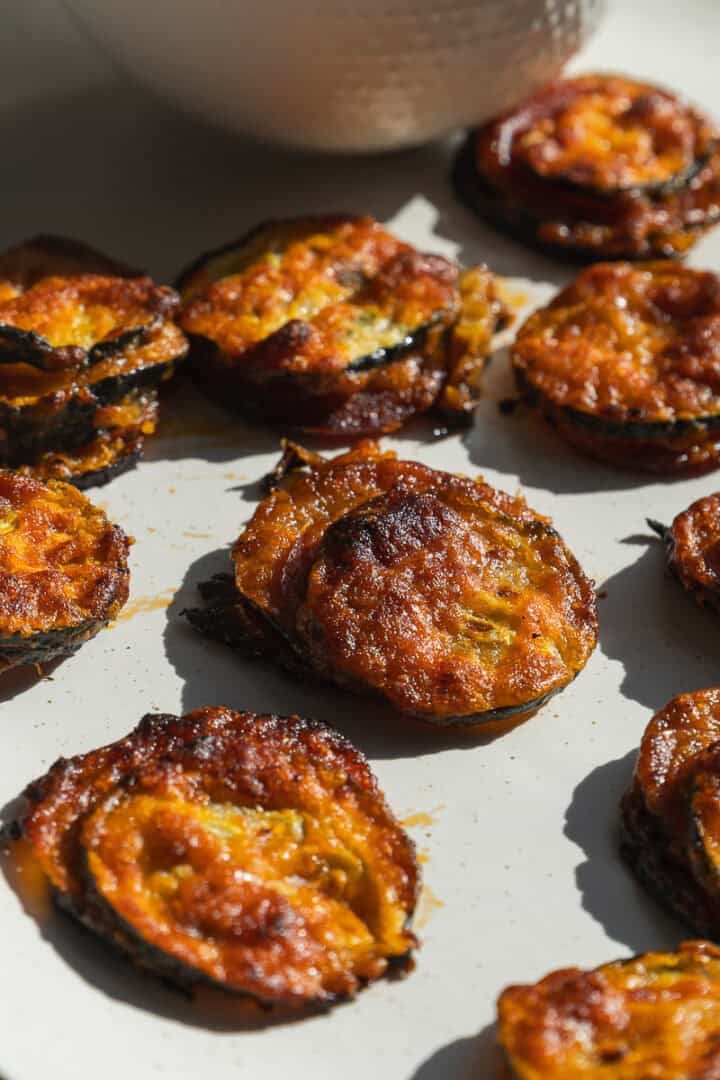 Zucchini pizza bites on a plate.